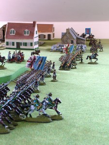 Troops of the Gateway Alliance parade beside Coinville on Henry Hyde's wargames table