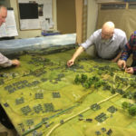 Richard Clark (left) and Chris Atkin (centre) command the Austrians at Swiepwald, whilst DZ decides how much of a mess they are in as they enter the Swiepwald during our 2015 game. The huge Austrian column flanking my position can be seen left of centre. Photo by Henry Hyde.