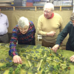 Chris Atkin (left) looks on as DZ attempts to disentangle the messy combat in the Swiepwald. Charles Grant checks that he won't lose his hard-won advantage! Meanwhile Andrew checks ranges between the Prussian flanking force and Austrian infantry. Photo Henry Hyde 2015.