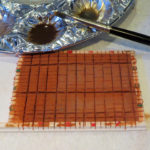 I used a dark umber and a light grey wash to get a red-brown brick colour.